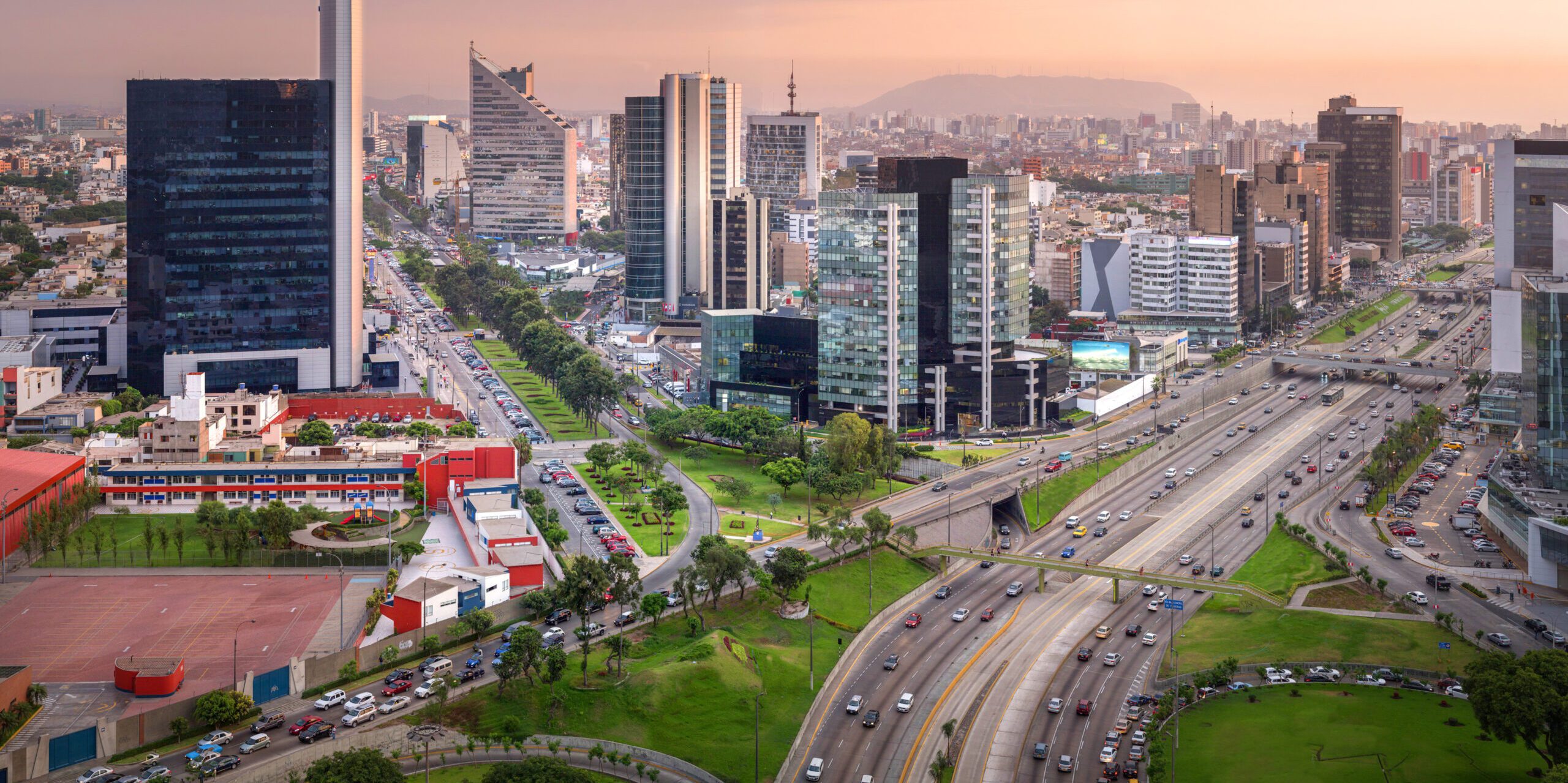 Lima,,Peru:,View,Of,San,Isidro,At,Sunset.